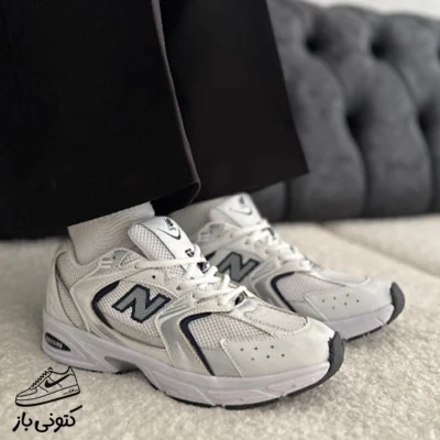 کتونی زنانه نیوبالانس سفید سرمه ای